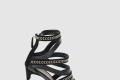 [MCQUEEN-알렉산더맥퀸]가죽 샌들 및 골드 액센트 559912