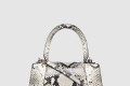[BALENCIAGA-발렌시아가]뱀피 엠보 가죽 모래시계 클러치 564796