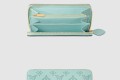 [LOUIS VUITTON-루이비통]펀칭 로고 지퍼 여밈 가죽 지갑 M83489